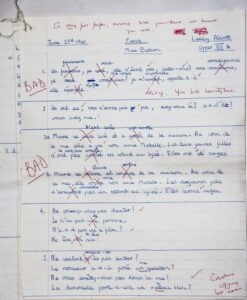 A handwritten French assignment with red ink corrections and critical comments like "BAD" and "Careless copying." A note says, “A very poor paper, showing that you have not learnt your work.”
